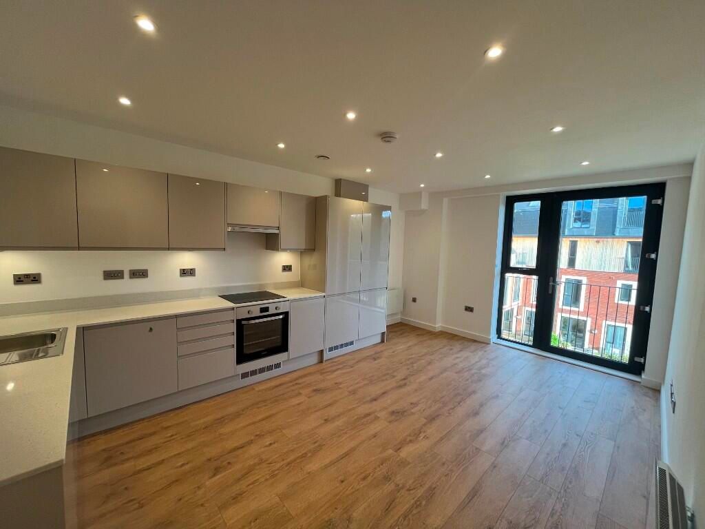 Property photo 2 of 6 Kitchen Living Area