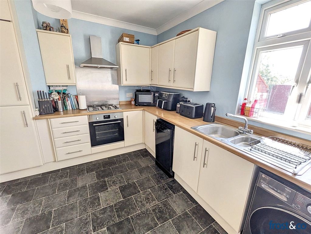 Property photo 3 of 12 Kitchen
