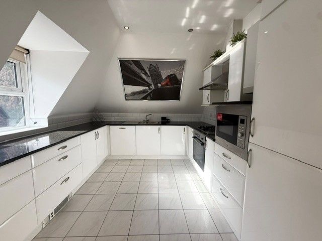 Property photo 2 of 12 Kitchen