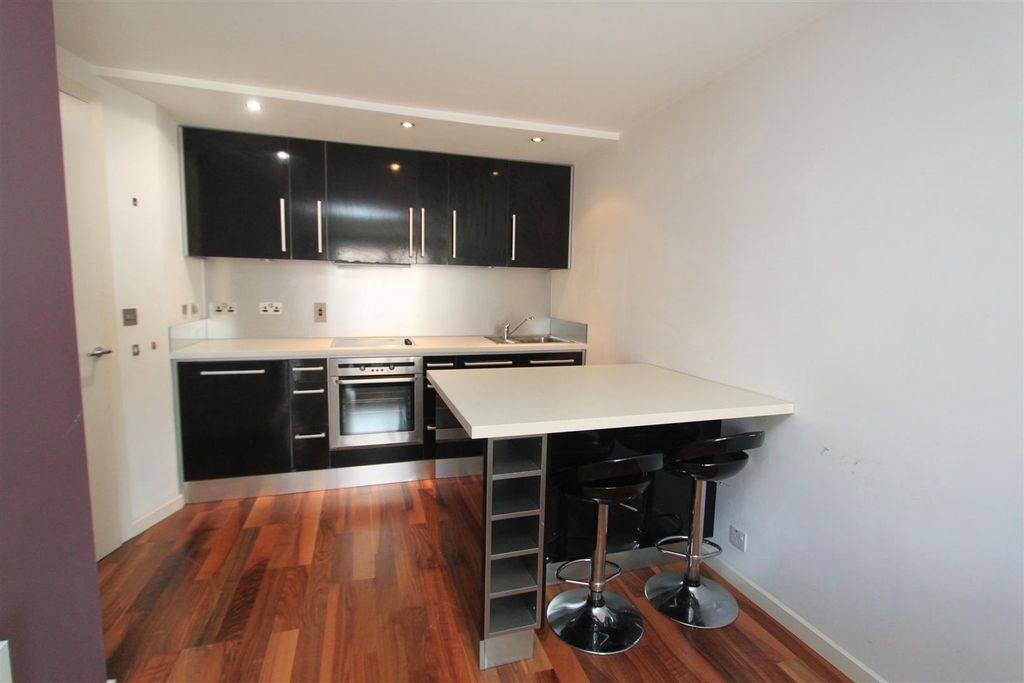 Property photo 2 of 9 Modern Kitchen With Breakfast Bar And Dark Units...