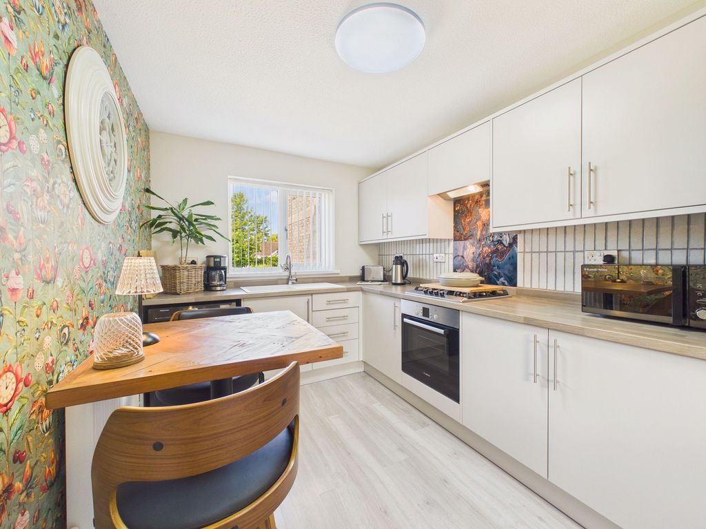 Property photo 2 of 12 Dining Kitchen
