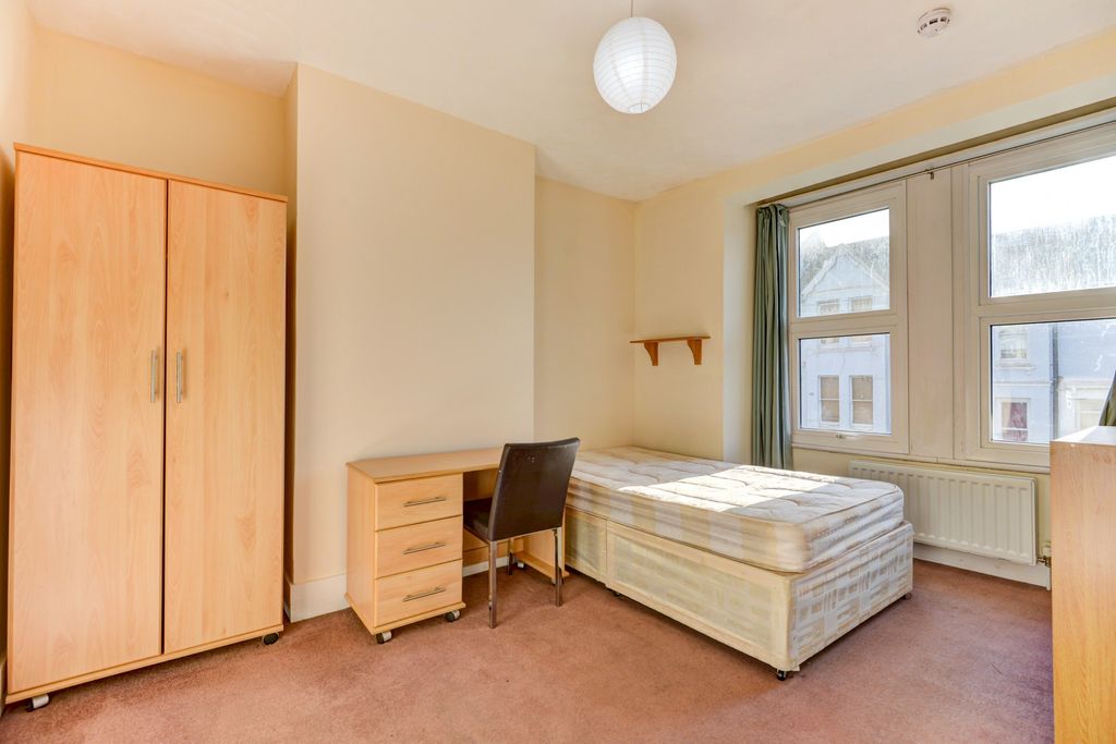 Property photo 3 of 19 A Bright And Simple Bedroom Featuring A Single Bed...