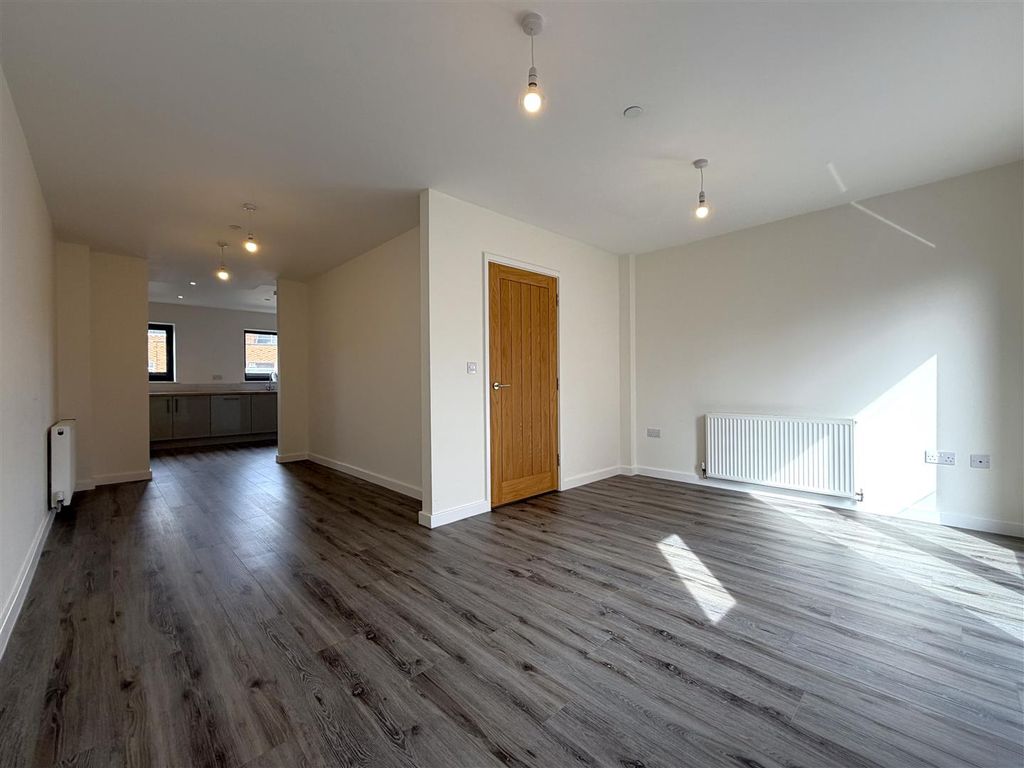 Property photo 2 of 23 Generous L-Shaped Living/Dining Space 333