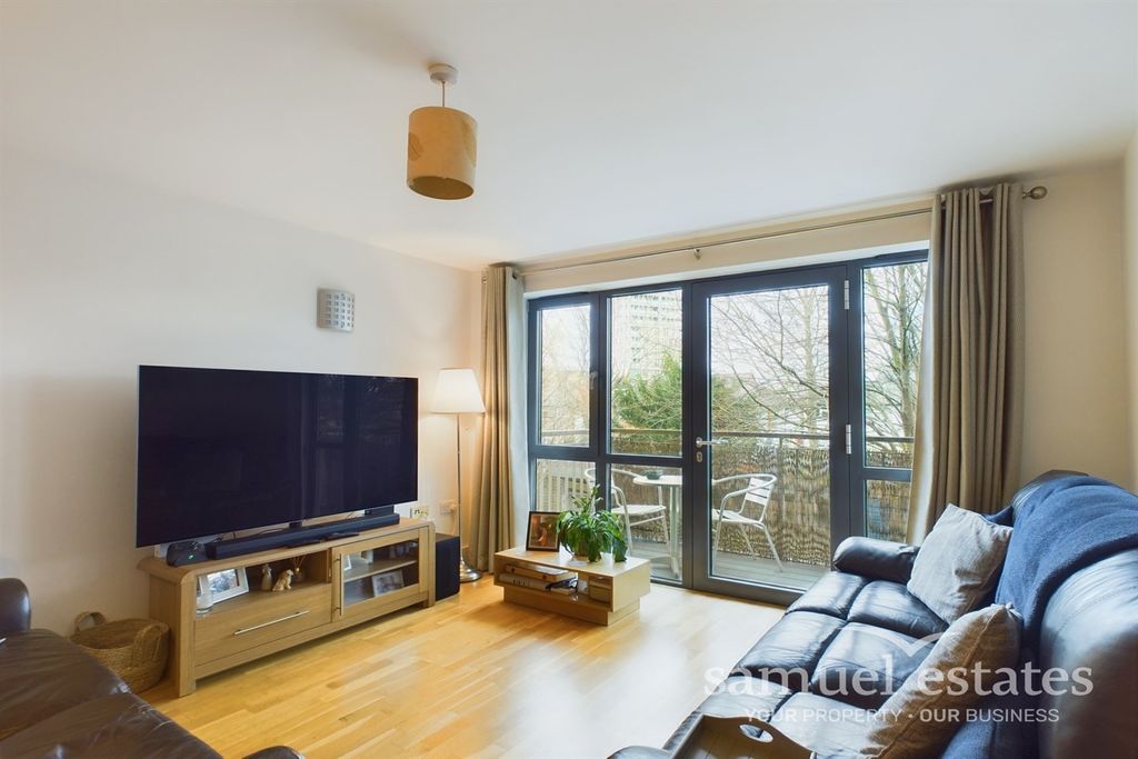 Property photo 1 of 12 Living Area
