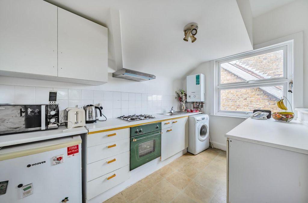 Property photo 3 of 12 Kitchen