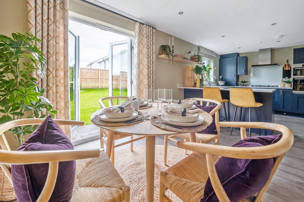 Property photo 1 of 12 The Dining Space Enjoys Views Of The Garden Through French Doors