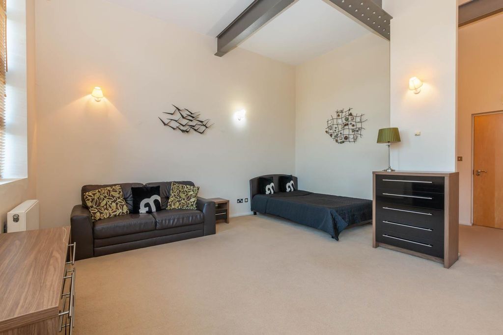 Property photo 3 of 9 Living Area