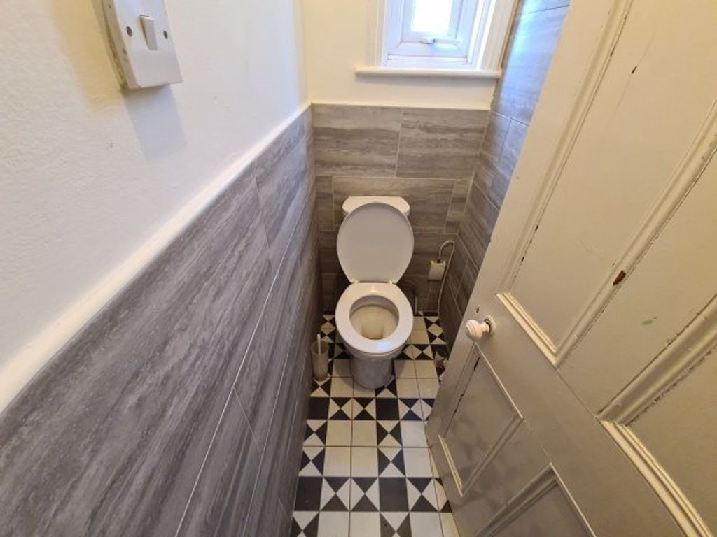 Property photo 1 of 26 A Clean And Well-Maintained Compact Toilet With Co...
