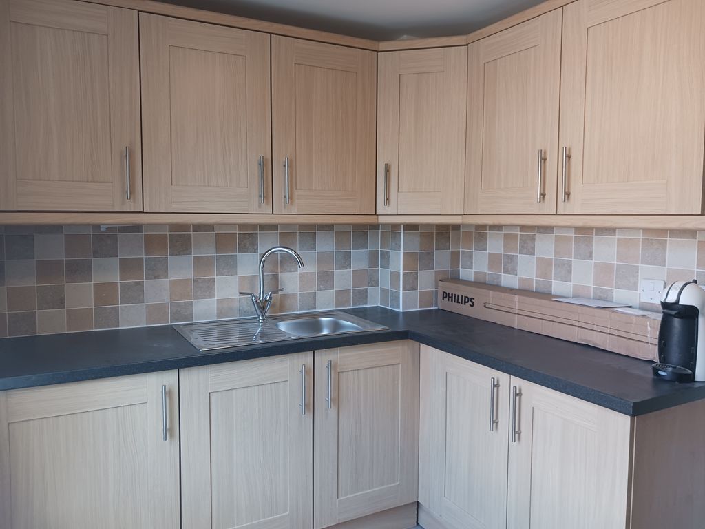 Property photo 3 of 7 Kitchen
