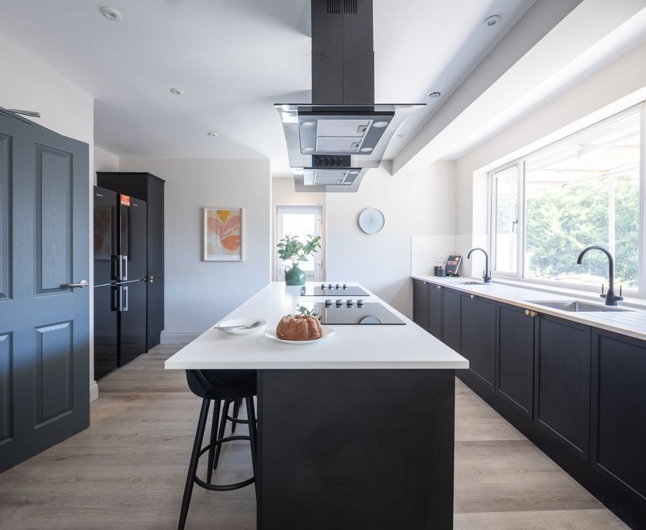 Property photo 2 of 15 Bright Modern Kitchen With A Central Island, Sleek...