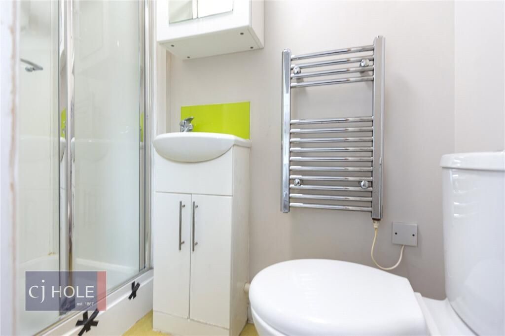 Property photo 3 of 8 A Bright And Well-Maintained Bathroom Featuring A ...
