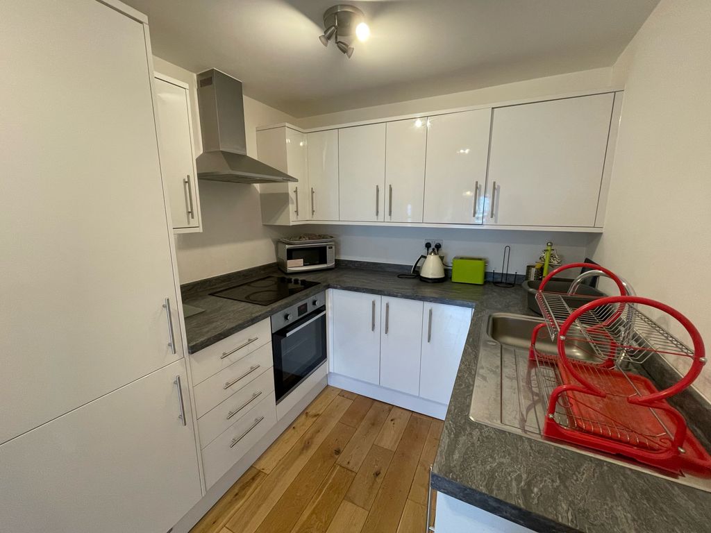 Property photo 3 of 9 Kitchen