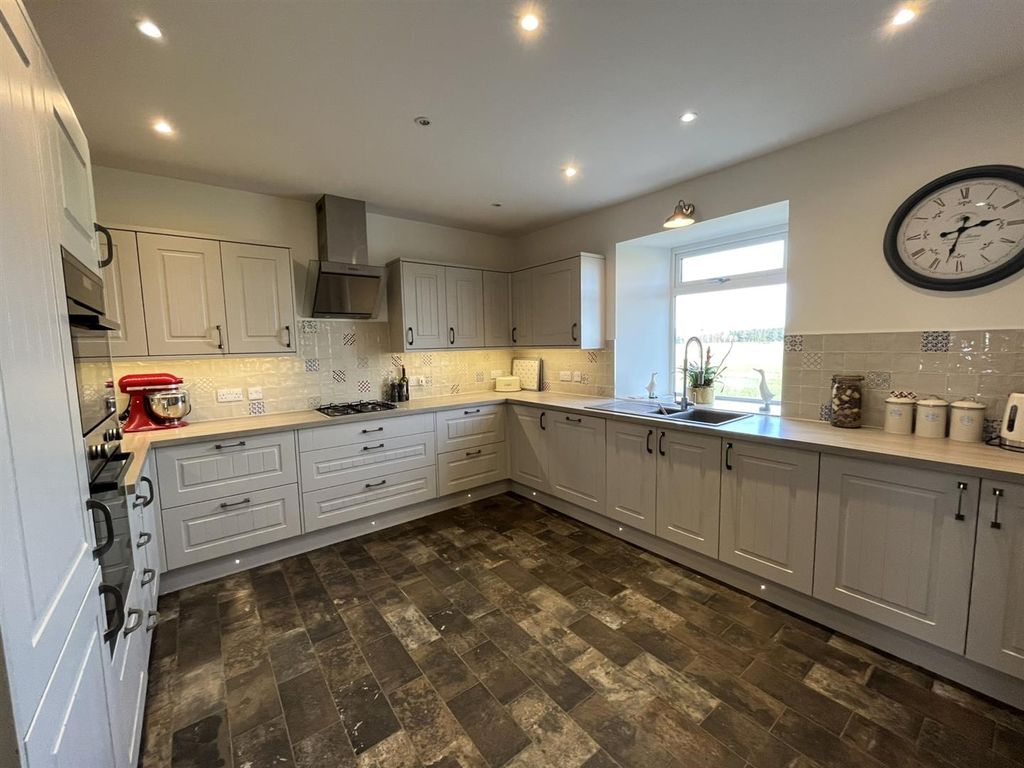 Property photo 2 of 46 Dining Kitchen