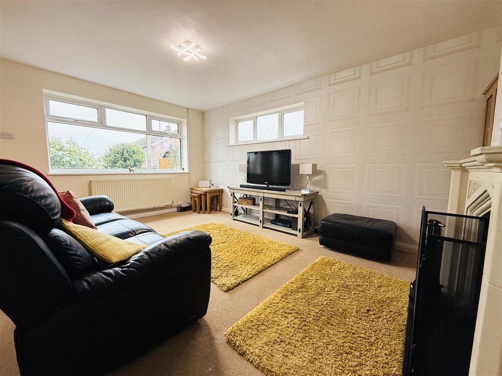 Property photo 3 of 16 Living Area