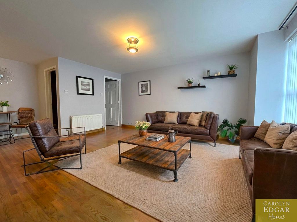 Property photo 3 of 13 Living]