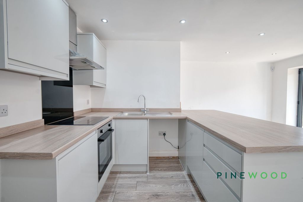 Property photo 3 of 12 Kitchen / Living Area