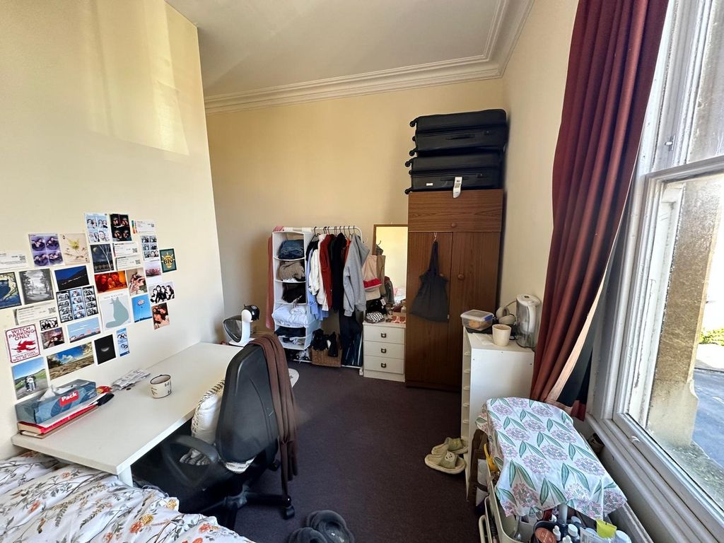 Property photo 3 of 17 A Cozy Double Bedroom Featuring A Comfortable Bed,...