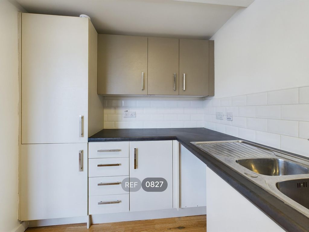 Property photo 3 of 18 Kitchen & Living Area