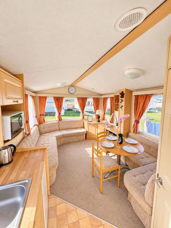 Property photo 2 of 12 Spacious Lounge With Wraparound Seating