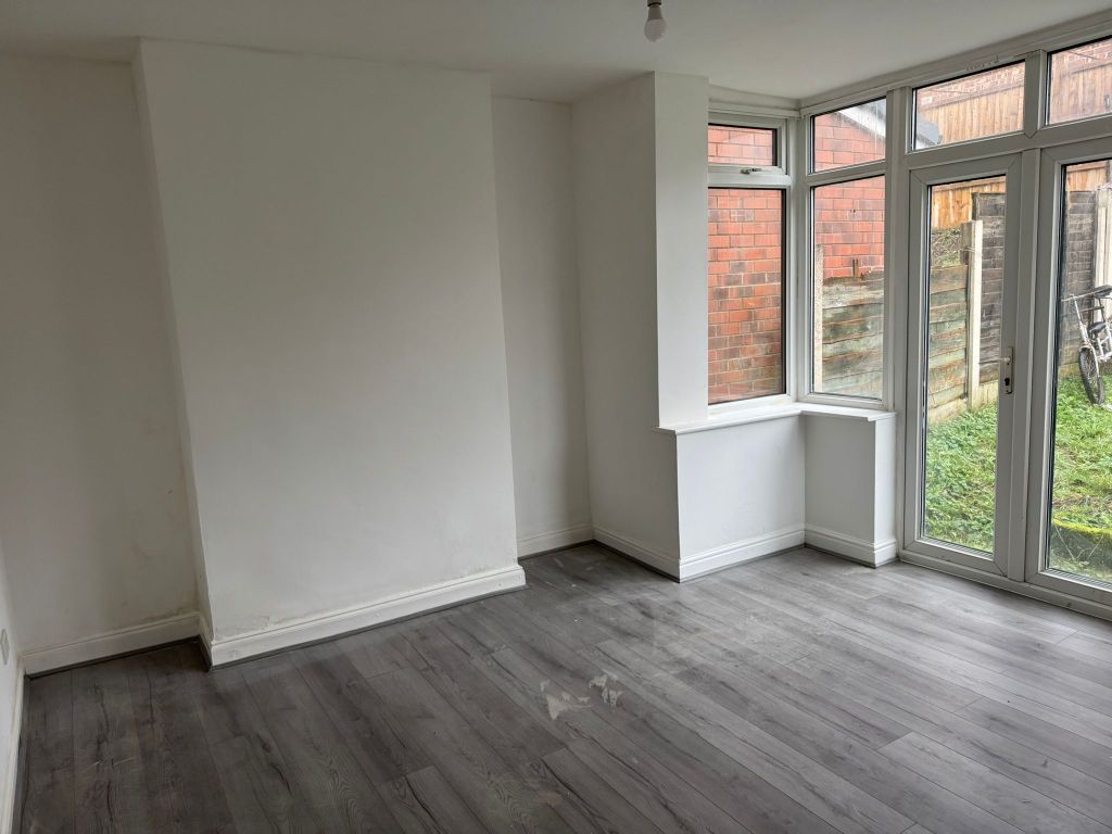 Property photo 3 of 12 Living Room 2