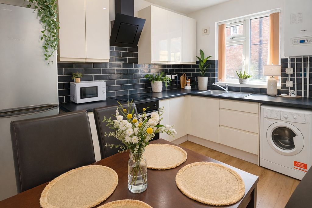 Property photo 3 of 7 Modern Fitted Kitchen With Dining Table And Plants...