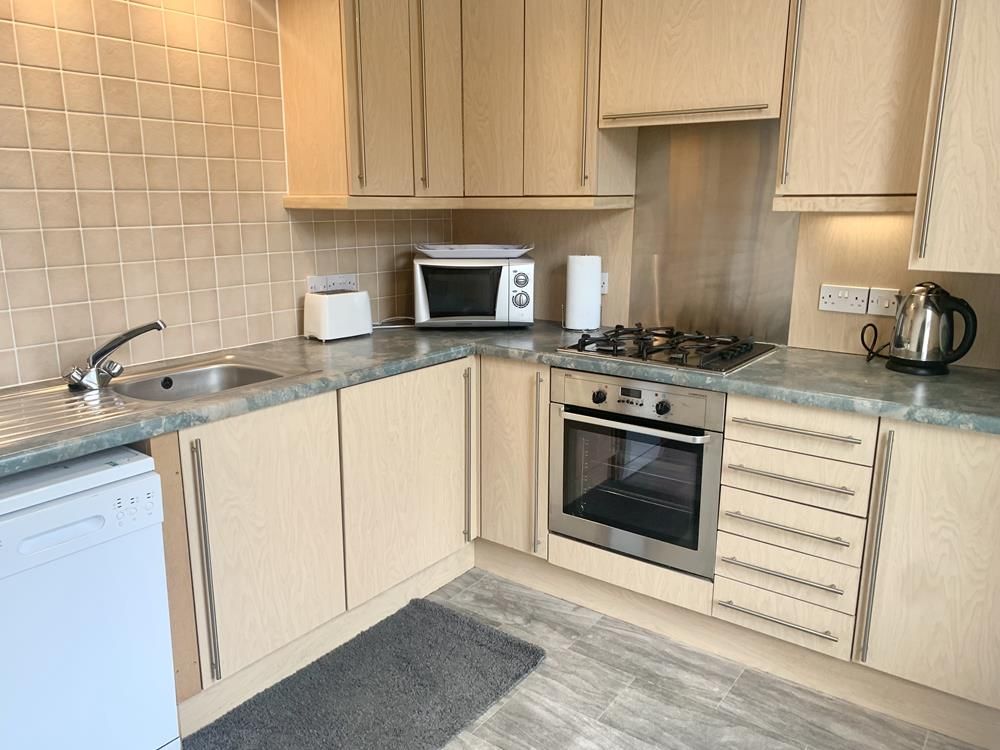 Property photo 3 of 9 Kitchen