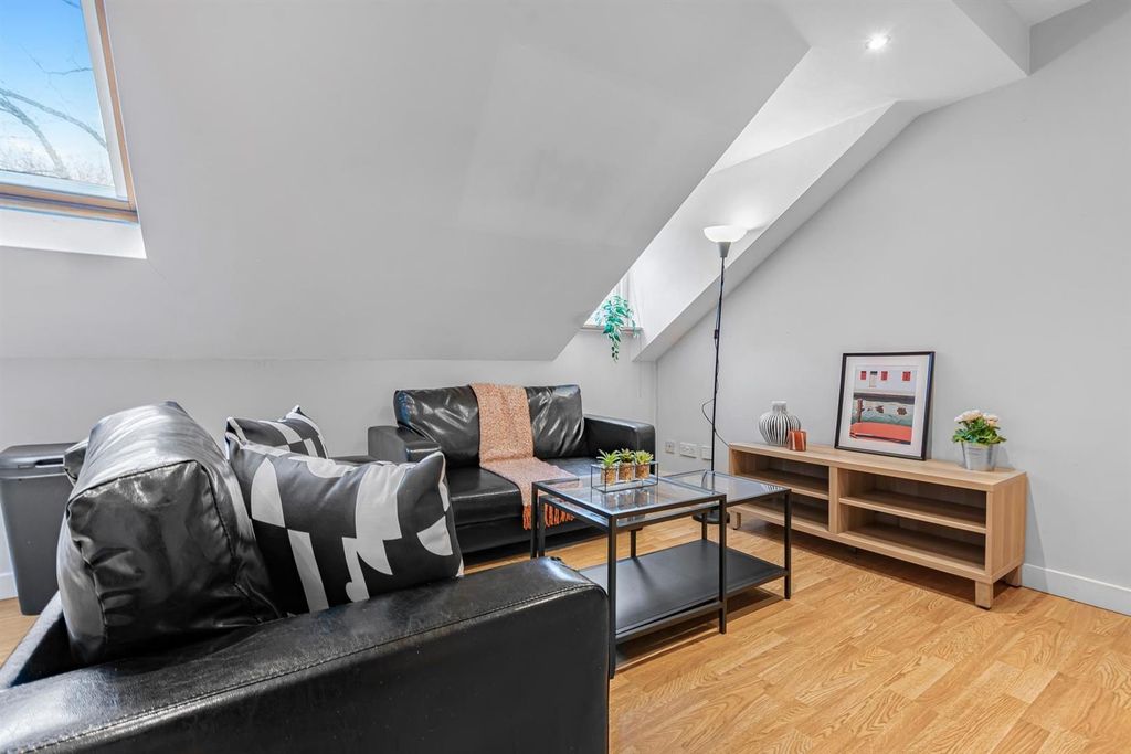 Property photo 3 of 9 Bright Lounge With Skylight And Modern Seating...