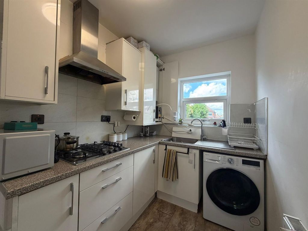 Property photo 3 of 12 Kitchen
