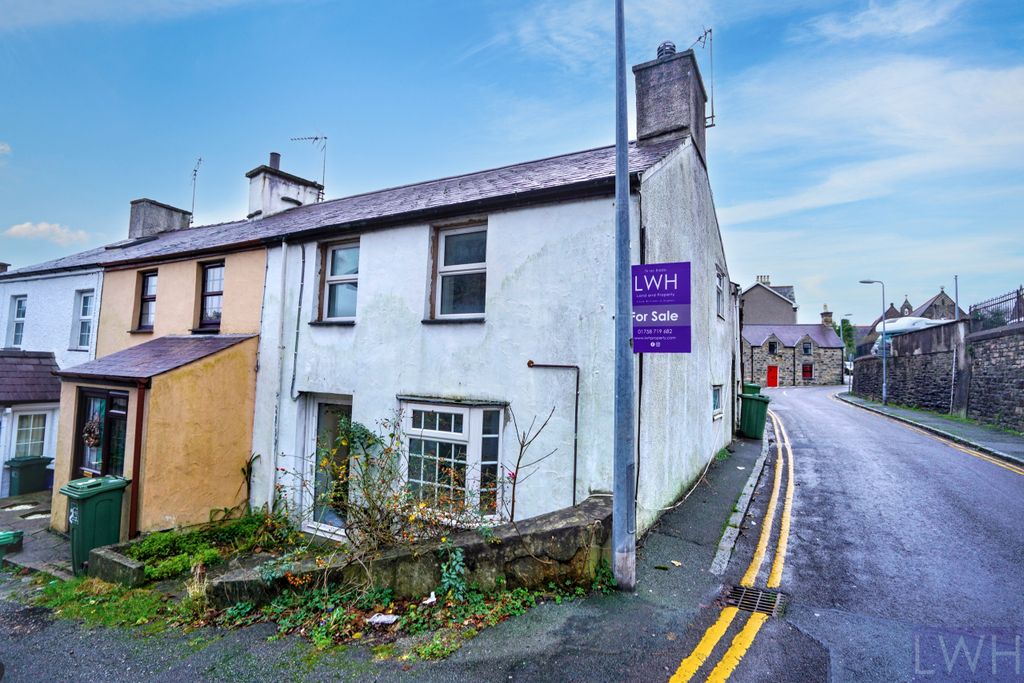 Property photo 2 of 10 Front And Side Elevation