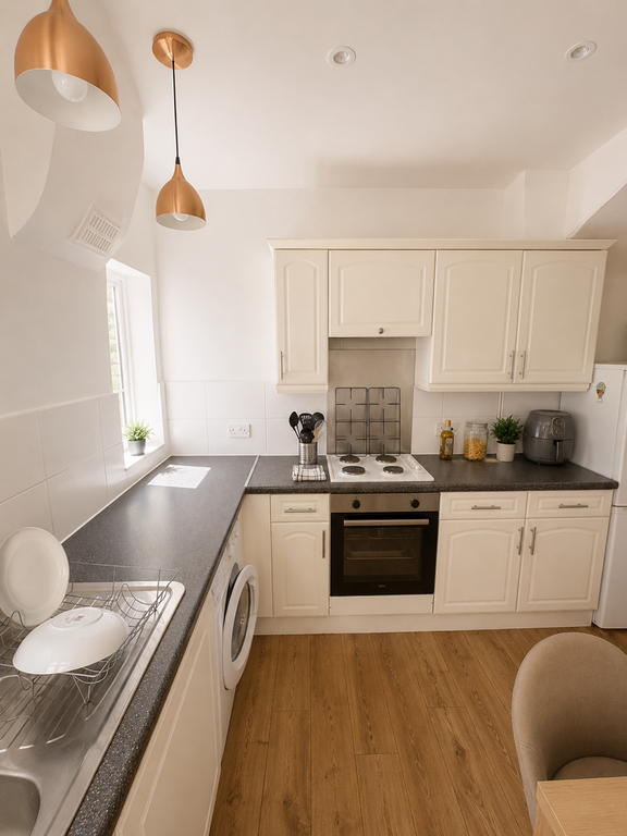 Property photo 2 of 7 Kitchen