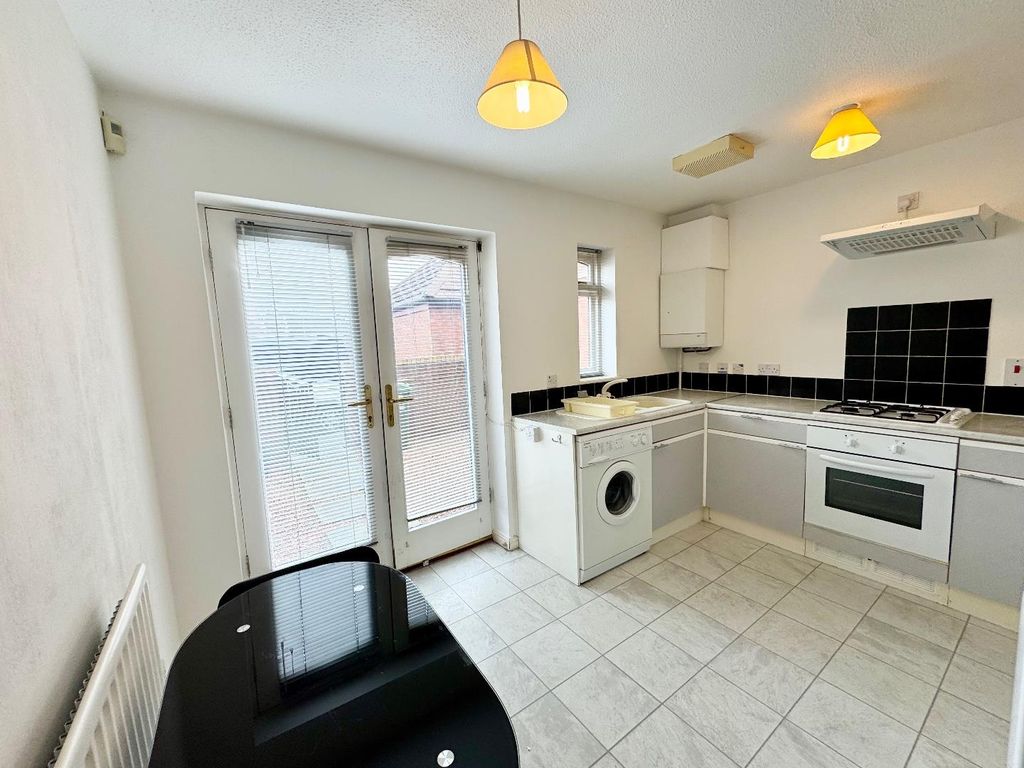 Property photo 2 of 11 Kitchen