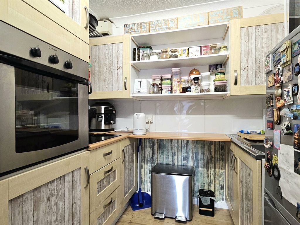 Property photo 3 of 12 Kitchen