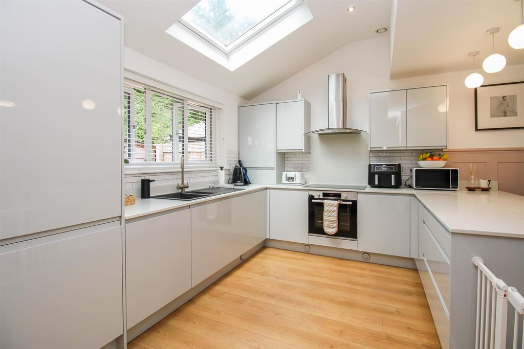 Property photo 3 of 17 L-Shaped Dining Kitchen