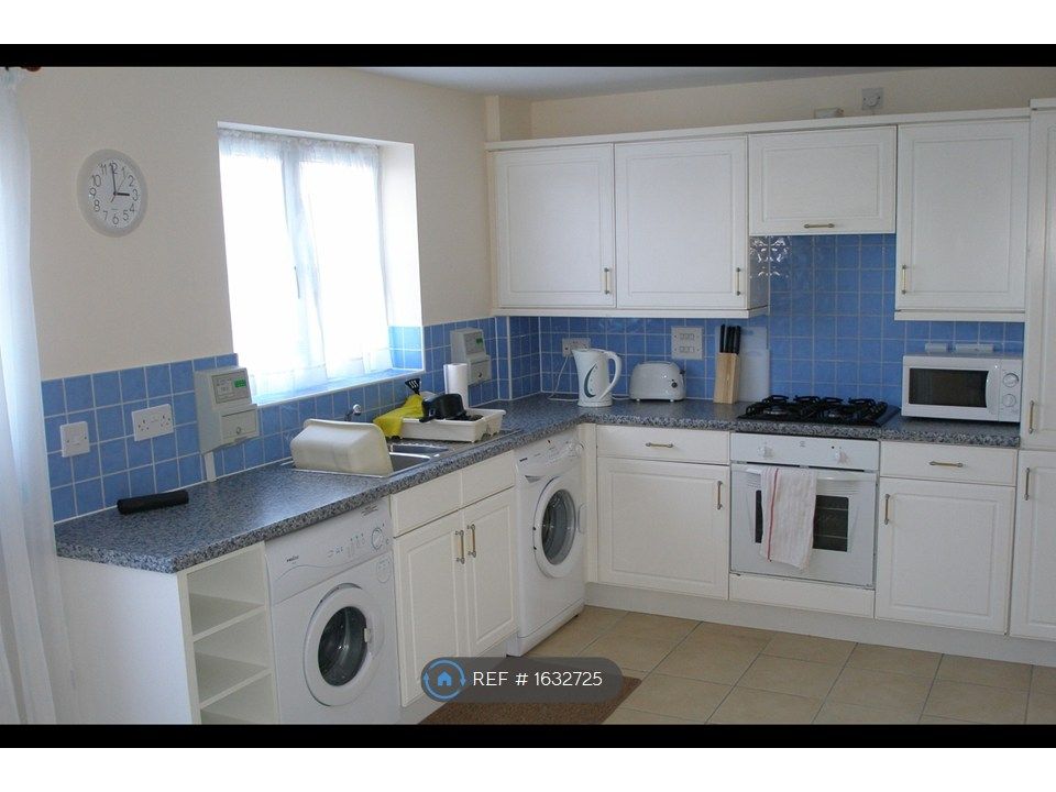 Property photo 3 of 10 Kitchen/Utility Room