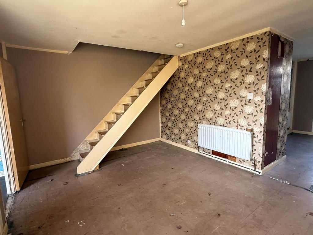 Property photo 3 of 10 Living Room In House In Need Of Improvement