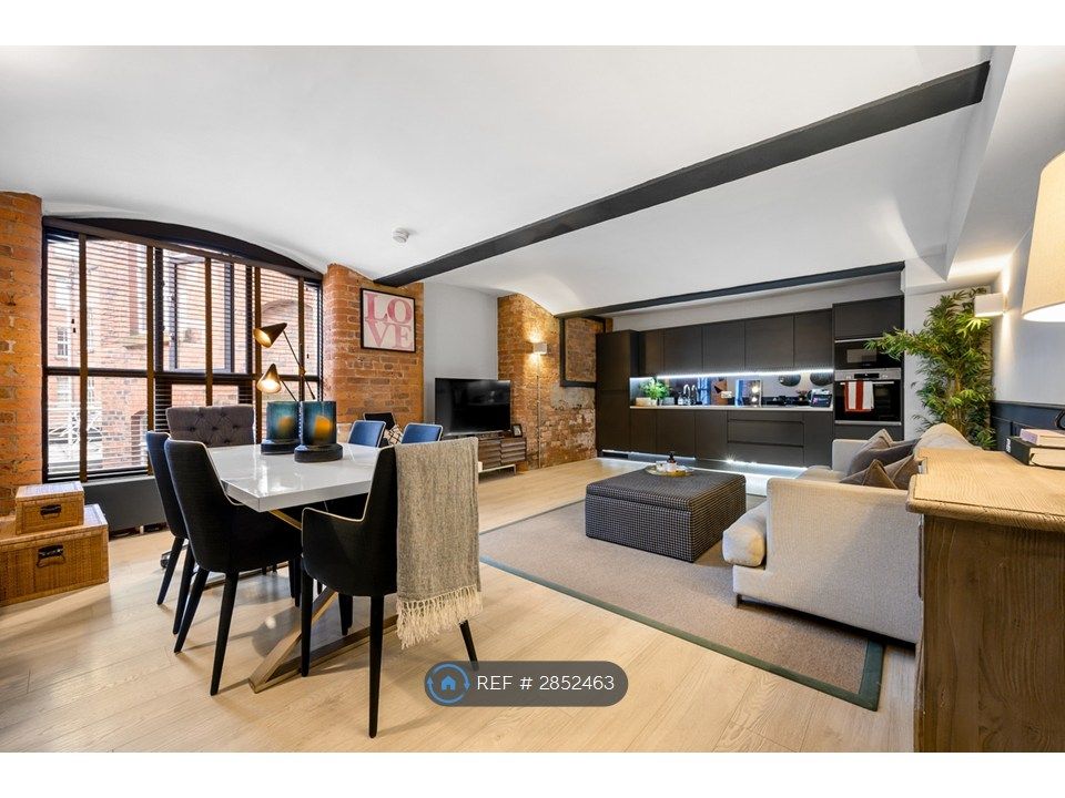 Property photo 1 of 8 Kitchen + Living Space