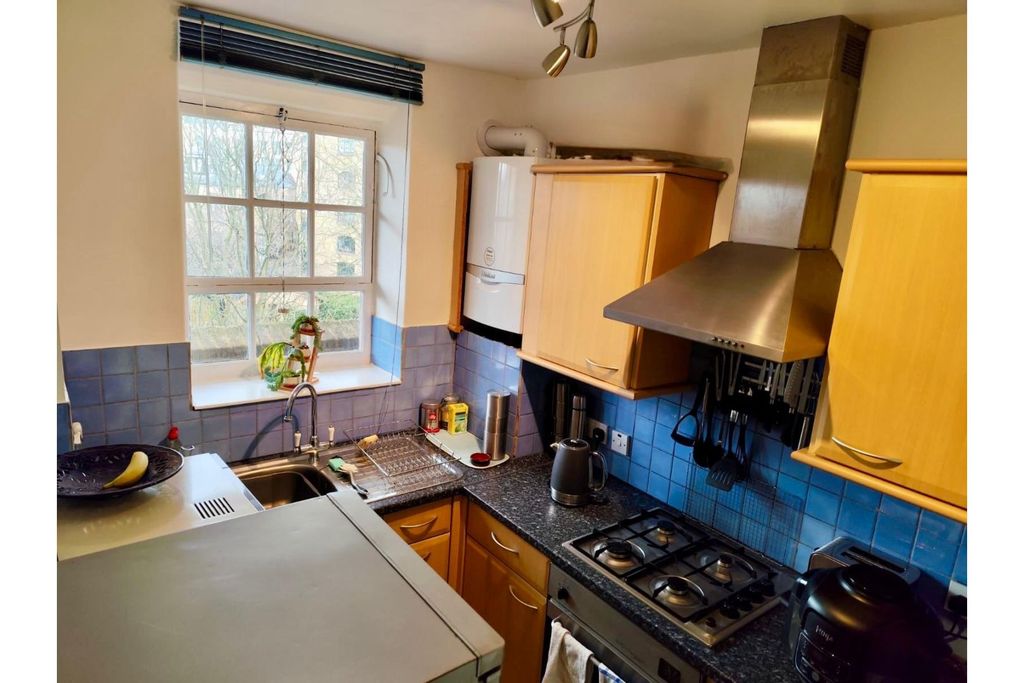 Property photo 3 of 12 Kitchen