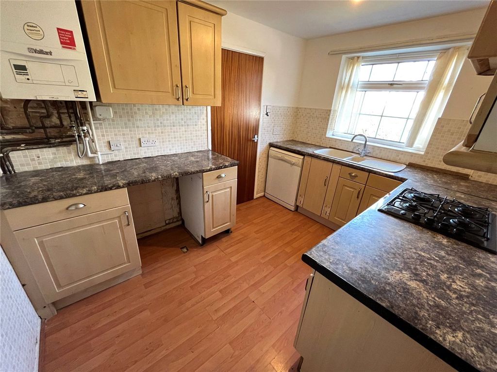 Property photo 2 of 12 Kitchen