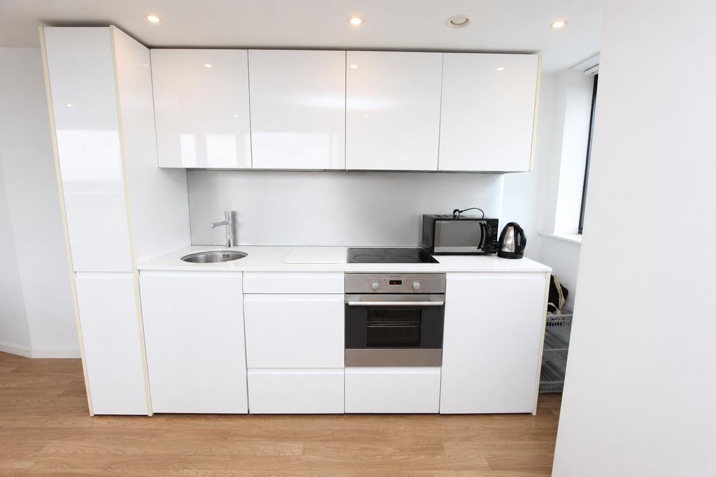 Property photo 3 of 12 Modern Gloss Kitchen With Integrated Appliances...