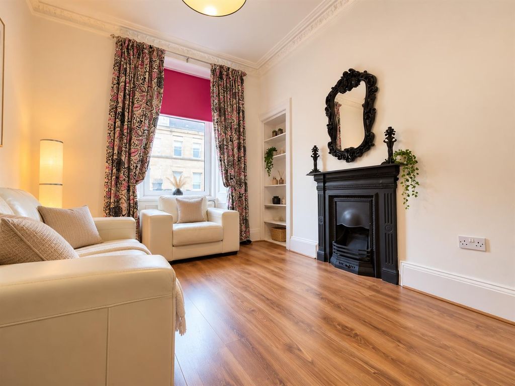 Property photo 3 of 12 Elegant Living Room With Ornate Fireplace.Png