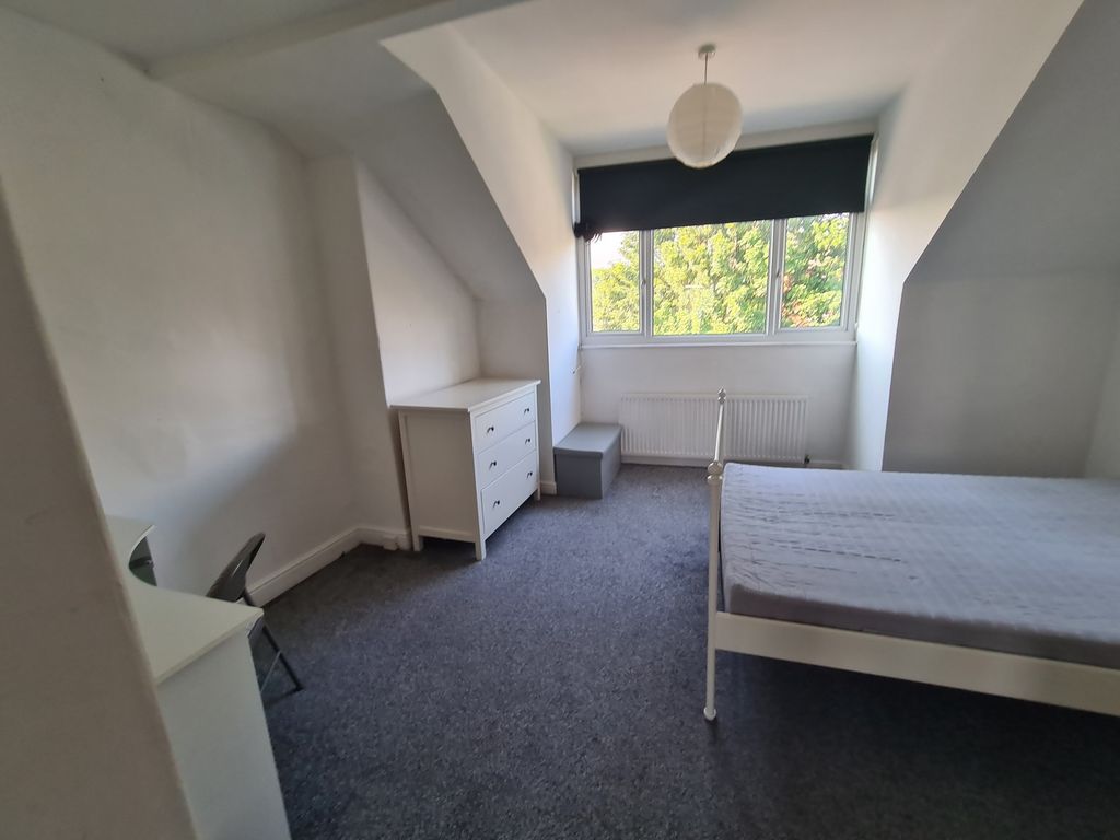 Property photo 2 of 20 A Bright And Tidy Bedroom Featuring A Large Window...