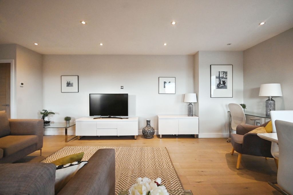 Property photo 3 of 12 Living Area