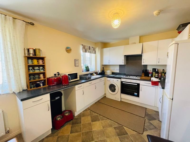 Property photo 3 of 7 Kitchen Area