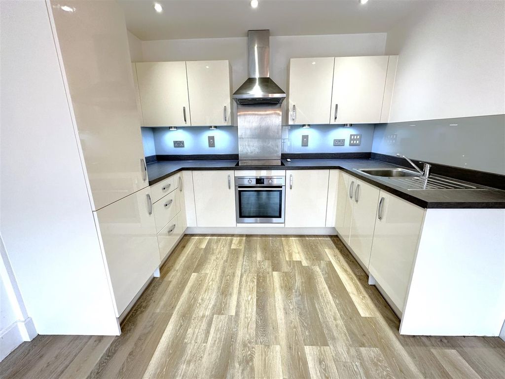 Property photo 2 of 16 Kitchen Area