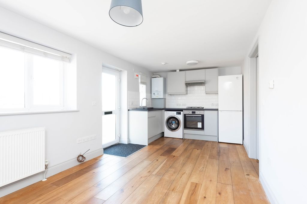 Property photo 3 of 7 Kitchen Living Area