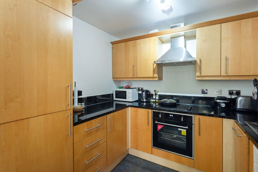 Property photo 2 of 12 Kitchen