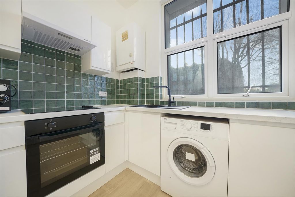 Property photo 2 of 11 Kitchen With Sitting Area