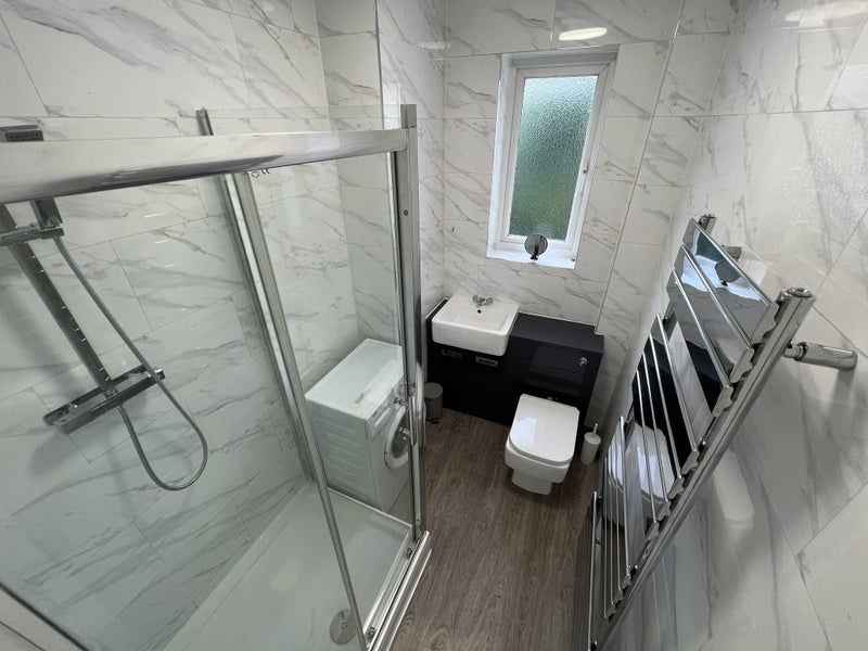 Property photo 3 of 10 Bright And Modern Bathroom Suite Featuring A Spaci...
