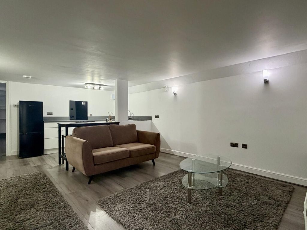 Property photo 2 of 12 Living Room