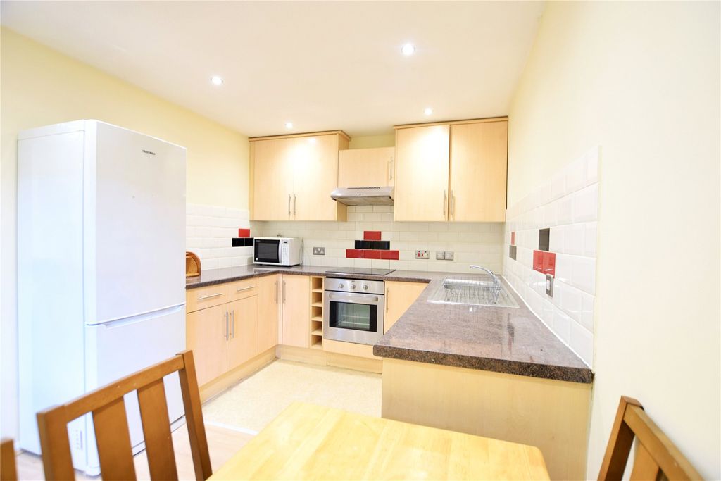 Property photo 3 of 7 Kitchen